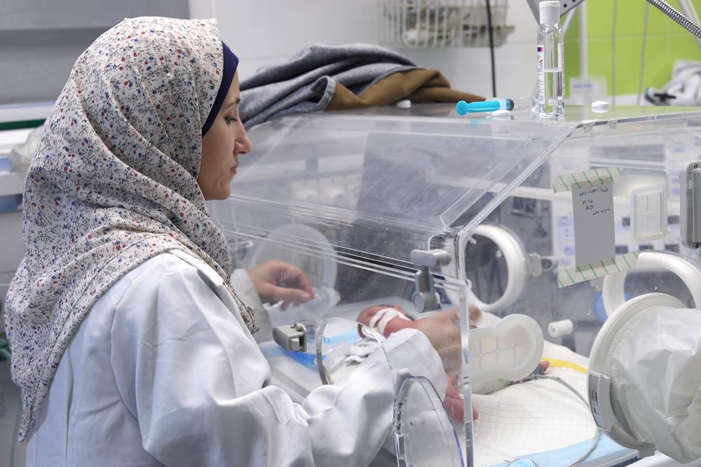 MSF nurse checking on one of the premature newborns admitted to the neonatal intensive care unit of MSF supported Nasser hospital, Khan Younis, Gaza.