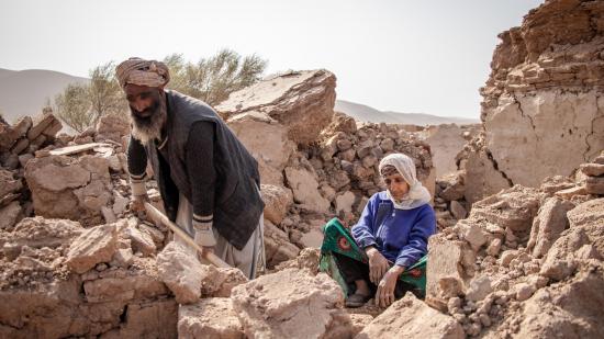 Abdul Salaam and the remains of his house