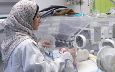 MSF nurse checking on one of the premature newborns admitted to the neonatal intensive care unit of MSF supported Nasser hospital, Khan Younis, Gaza.